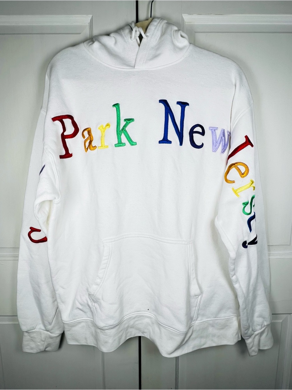 White Hoodie Raised Stitch Embroidered Text Across From Sleeve to Sleeve Sz XL